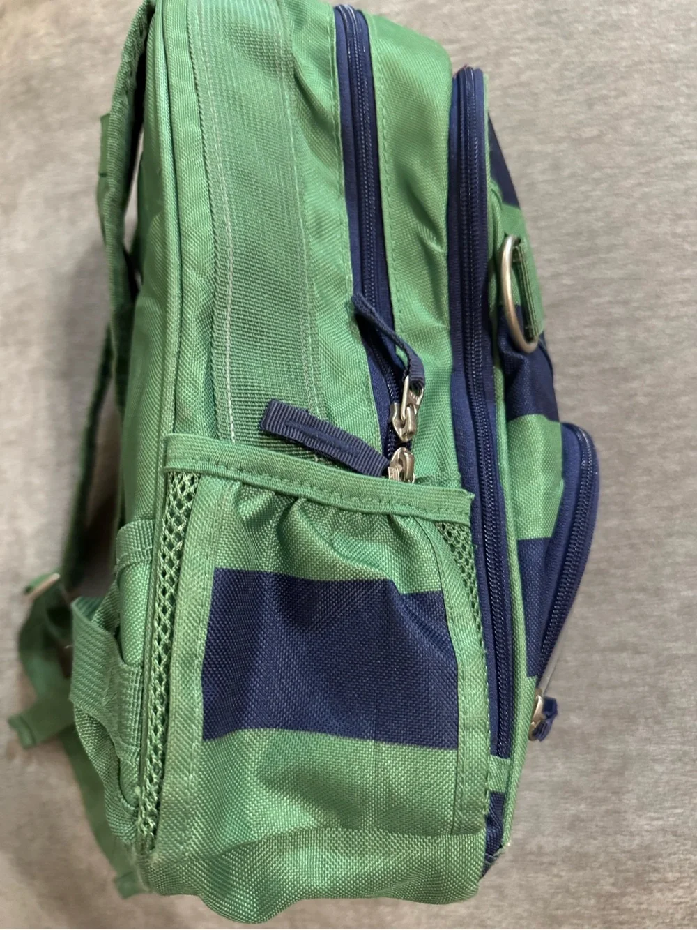 Pottery Barn Kids Green and Navy Striped Backpack with matching lunch box.